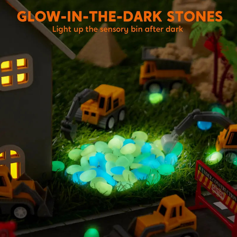 Construction Themed Sensory Bin With Glow In The Dark Rocks