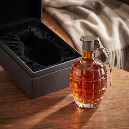 Grenade Whiskey Decanter beside an open gift box