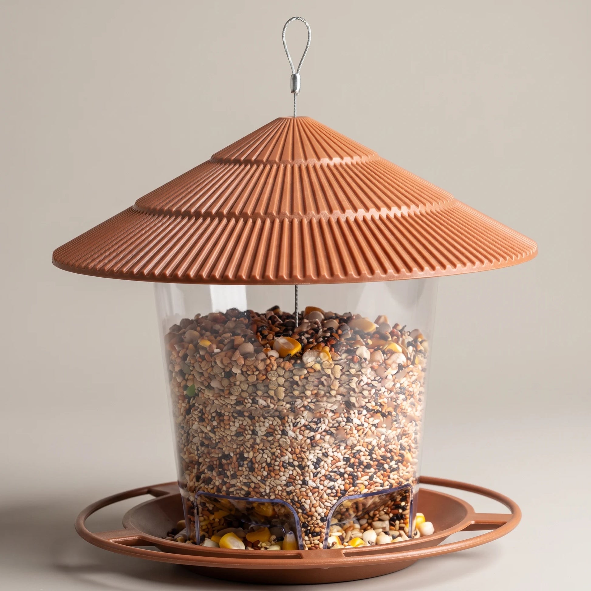Gazebo-roof bird feeder with clear hopper