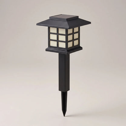 Single black square lantern solar path light on its ground stake, studio shot