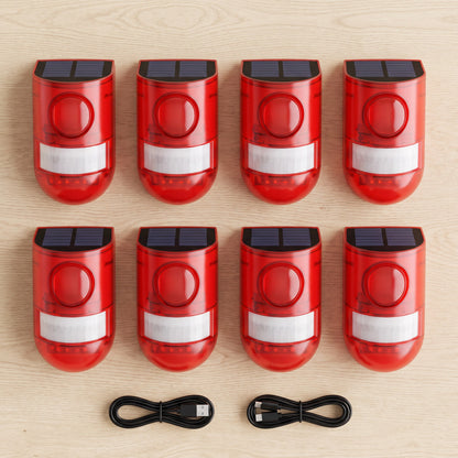 Eight solar motion alarms with USB charging cables