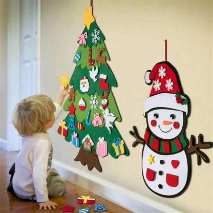 Felt Christmas tree and felt snowman on a wall with a toddler decorating