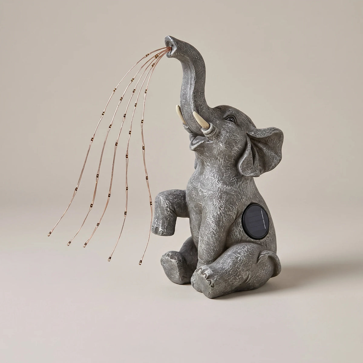 Solar elephant garden light, studio view with LEDs unlit