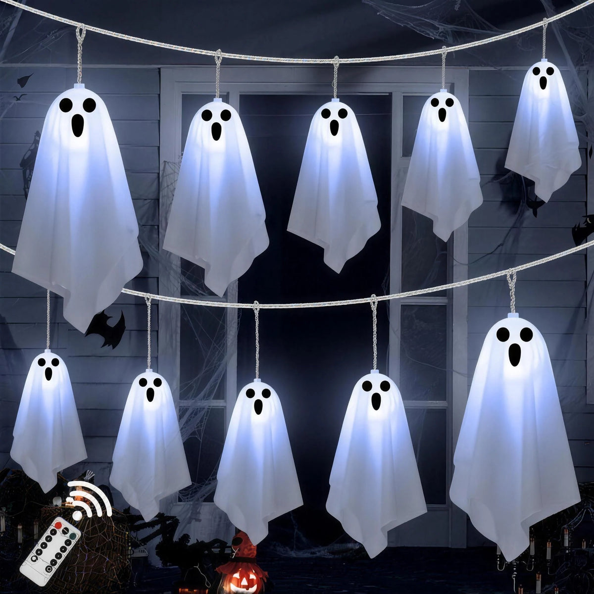 White Light hanging fabric ghost string lights in two swags with the remote