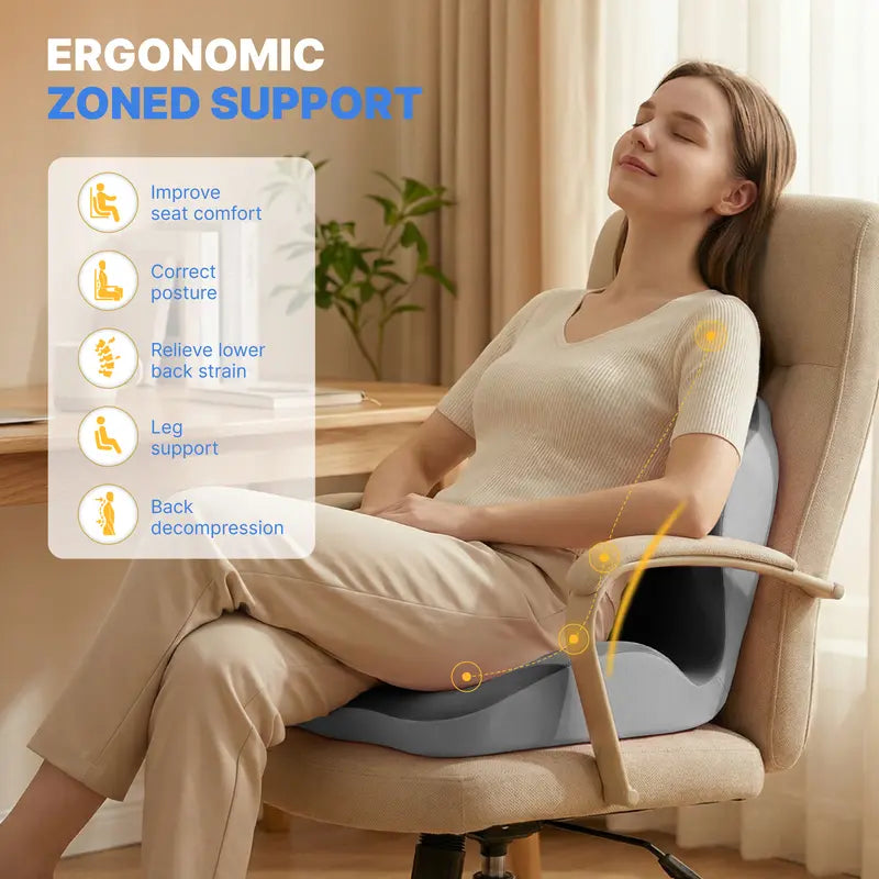 Woman sitting at a desk using the ergonomic memory foam seat cushion on an office chair