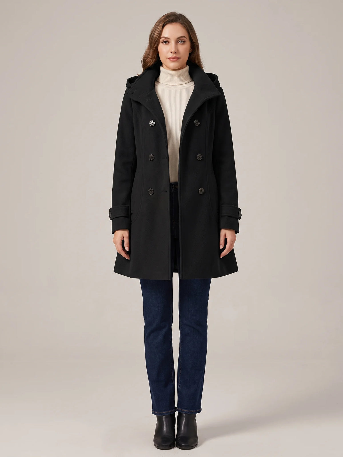 Black hooded wool pea coat shown from the front on a model, buttoned, hood down
