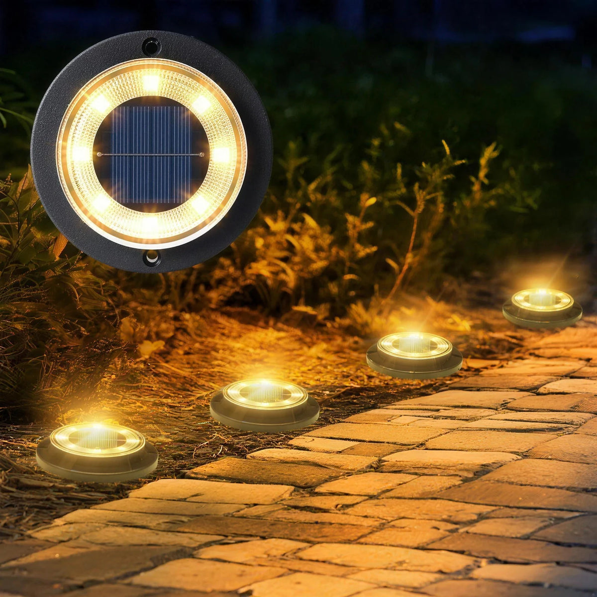 Close-up of a solar ground light showing the central solar panel and eight warm-white LEDs