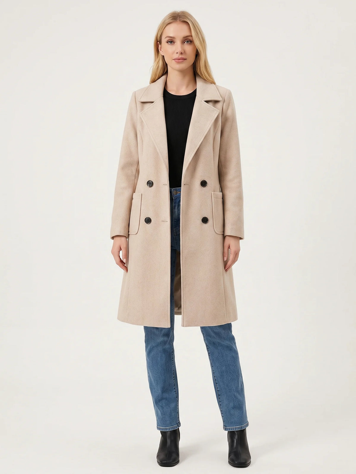 The Sand wool-blend coat worn open on a model, photographed from the front in a studio