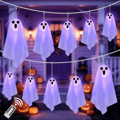 Purple hanging fabric ghost string lights across a decorated porch