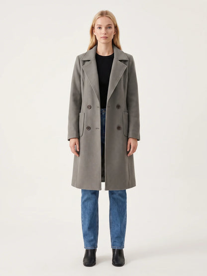 The Grey wool-blend coat worn open on a model, photographed from the front in a studio