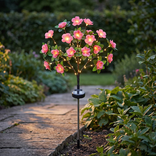 Pink solar azalea stake lit at dusk